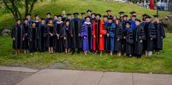 photo of CHSS faculty in regalia at 2022 graduation